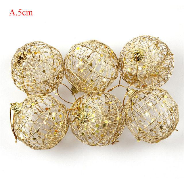 A set of six golden scaled Christmas baubles, featuring a luxurious design perfect for holiday decorations.