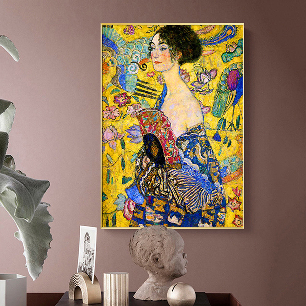 70cmx100cm canvas wall art featuring Klimt's Lady With A Fan, elegantly framed in gold, showcasing vibrant colors and intricate details.