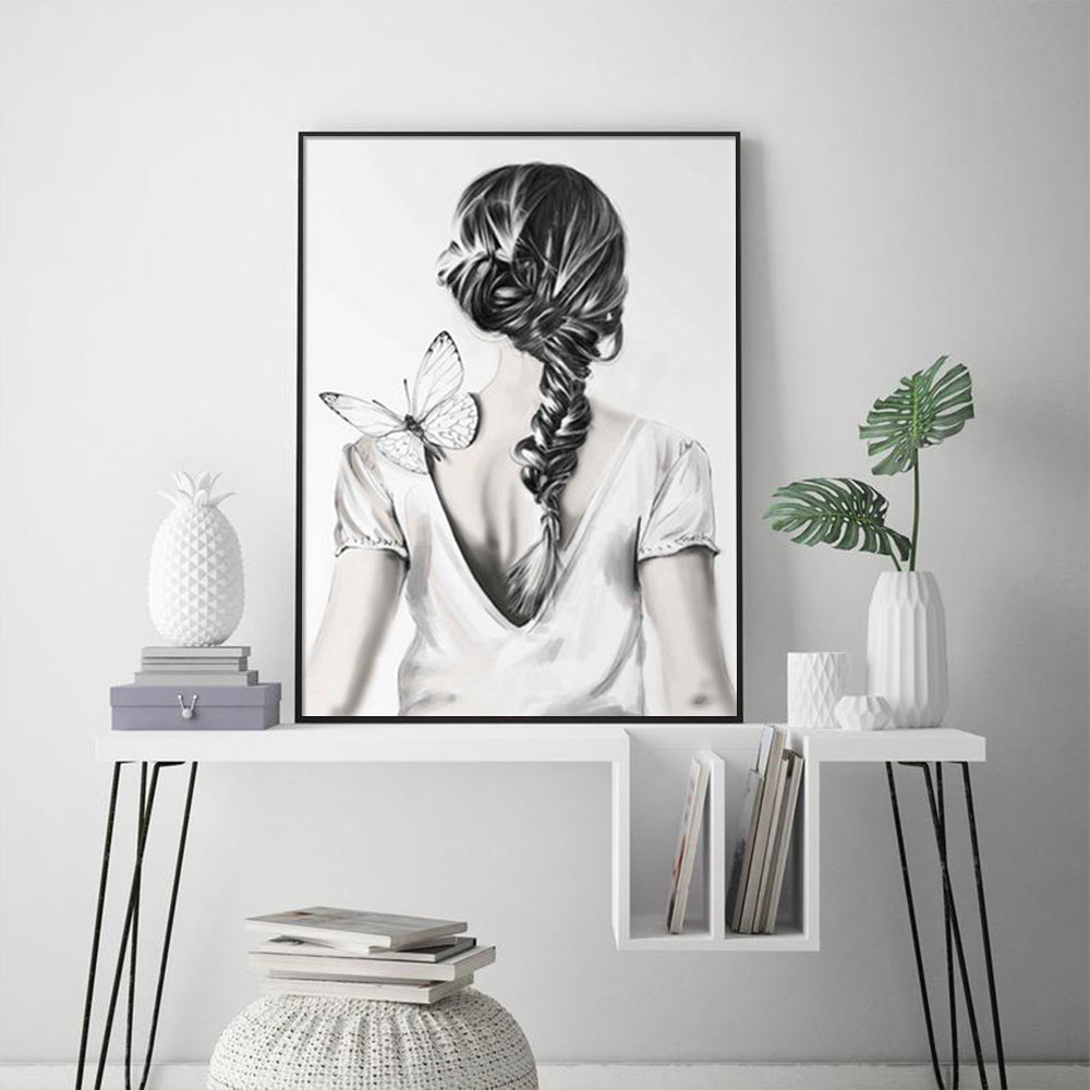 80cmx120cm canvas wall art featuring a woman back design with butterflies, framed in a sleek black floating frame.