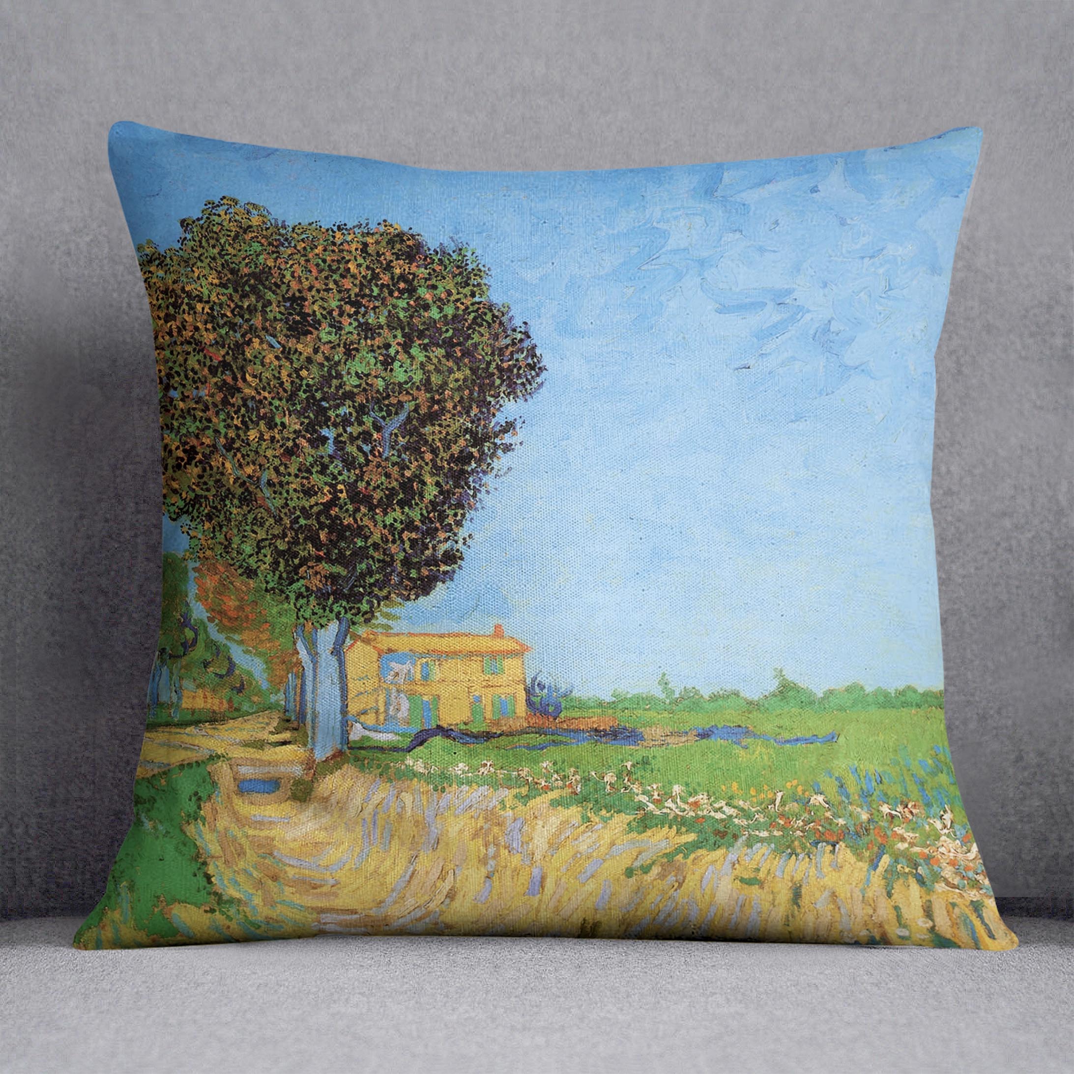 A vibrant cushion featuring Van Gogh's A Lane near Arles design, made from luxurious vegan faux suede.