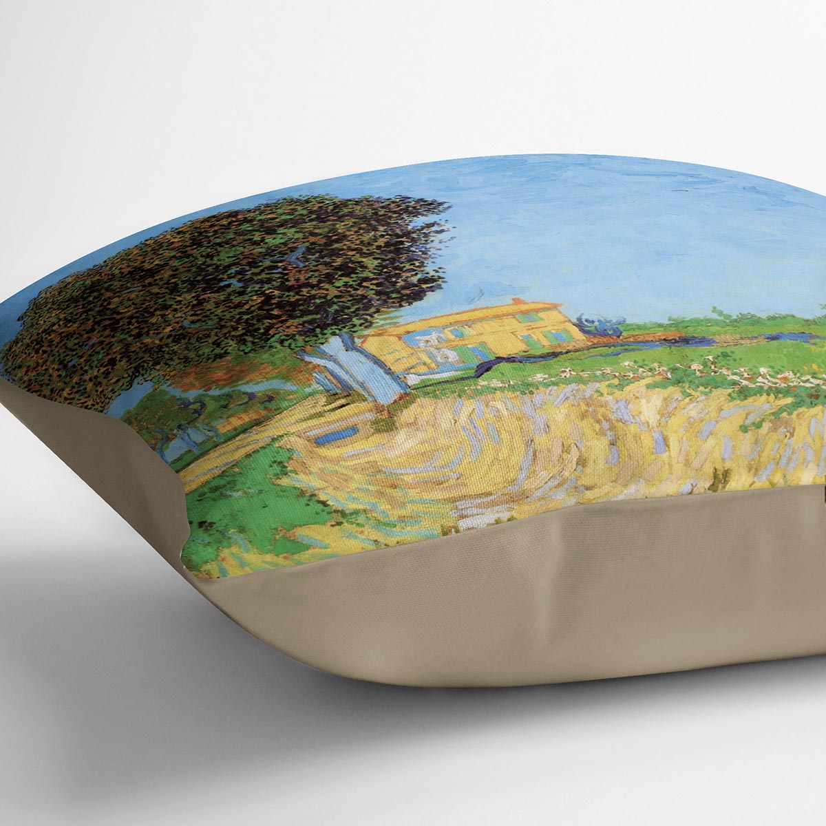 A vibrant cushion featuring Van Gogh's A Lane near Arles design, made from luxurious vegan faux suede.