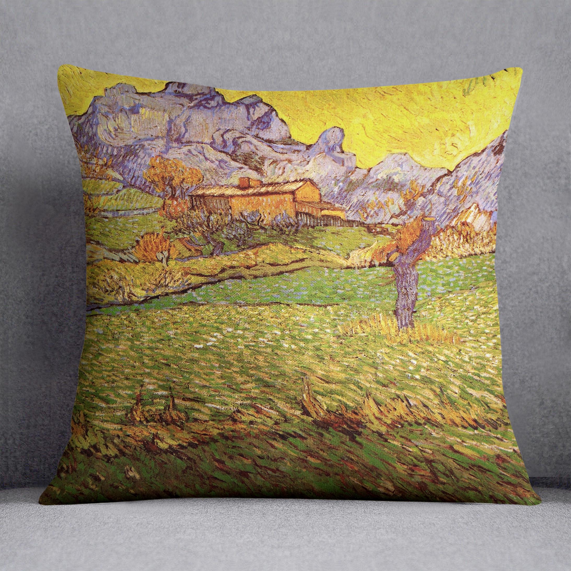 A vibrant cushion featuring Van Gogh's A Meadow in the Mountains design, made from luxurious vegan faux suede with plump filling.