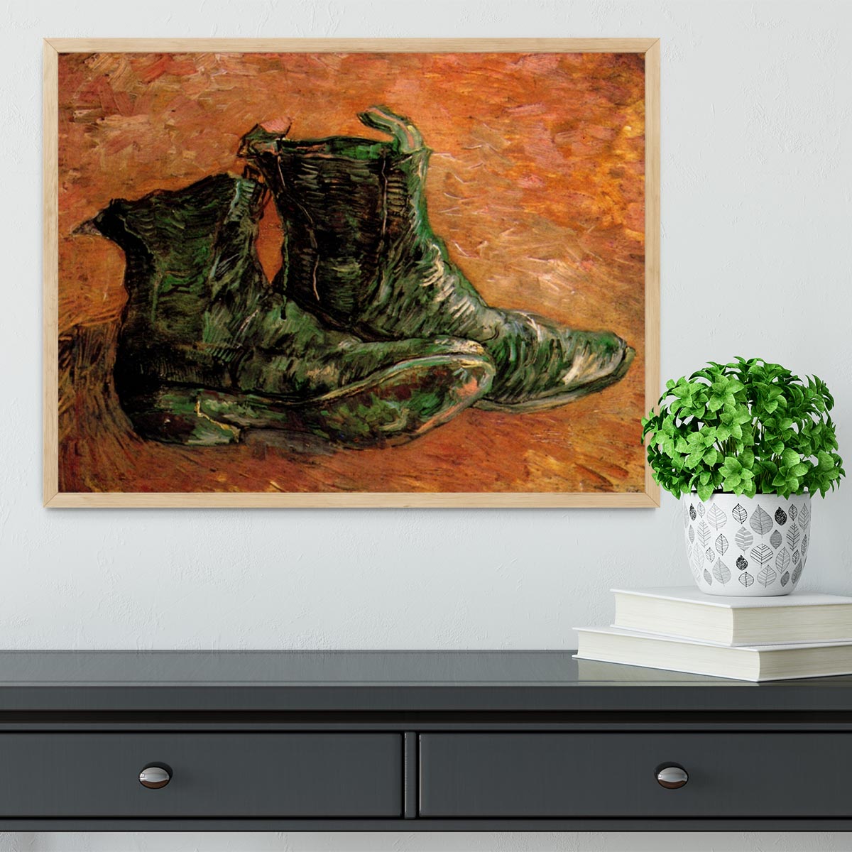 Framed print of Van Gogh's iconic shoes, showcasing vibrant colors and intricate details.