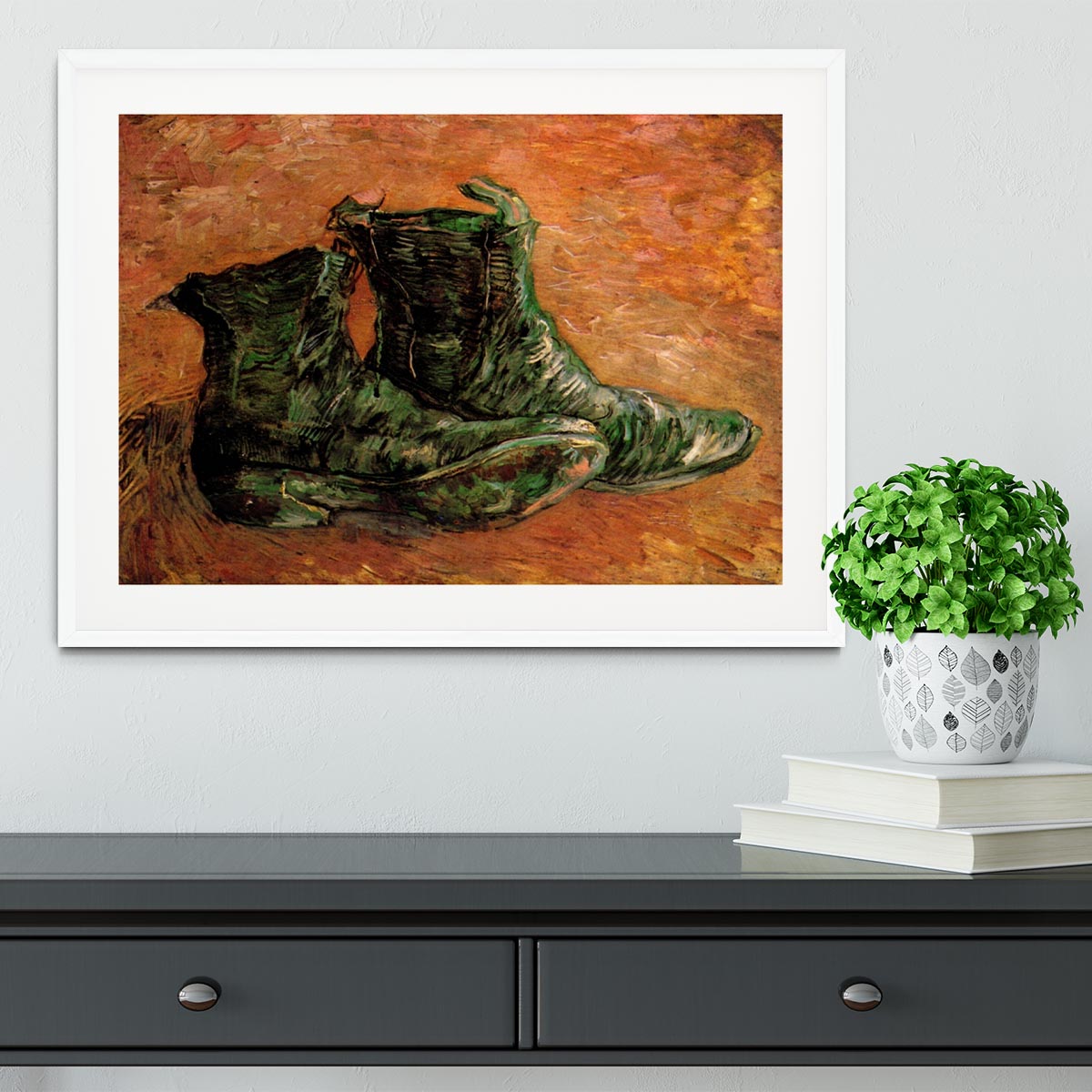 Framed print of Van Gogh's iconic shoes, showcasing vibrant colors and intricate details.