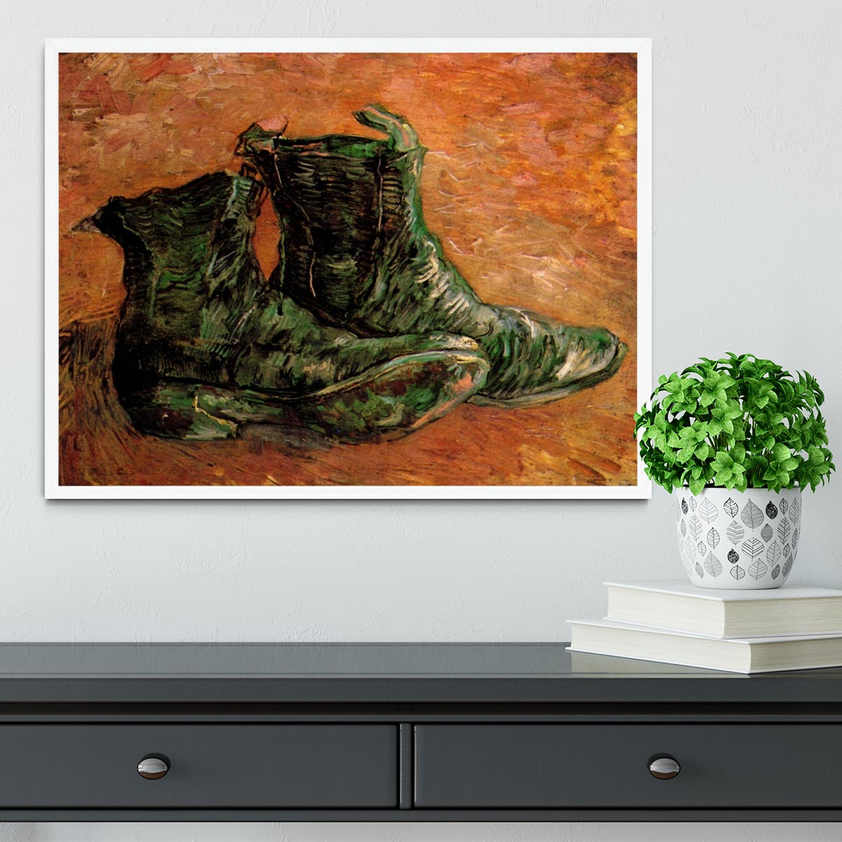 Framed print of Van Gogh's iconic shoes, showcasing vibrant colors and intricate details.