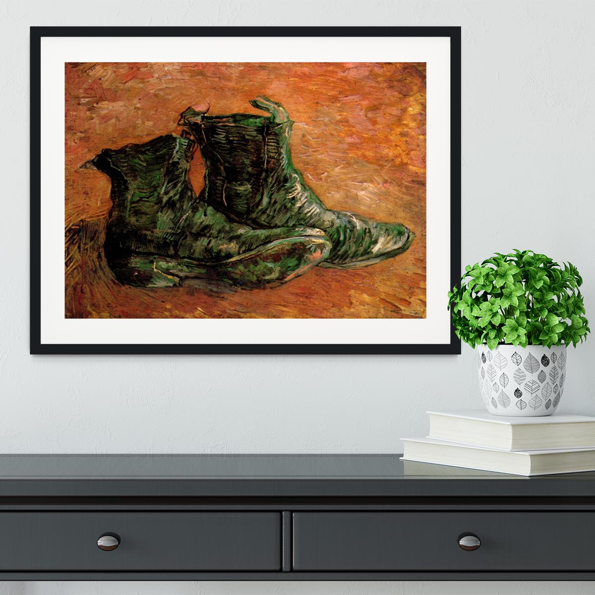 Framed print of Van Gogh's iconic shoes, showcasing vibrant colors and intricate details.