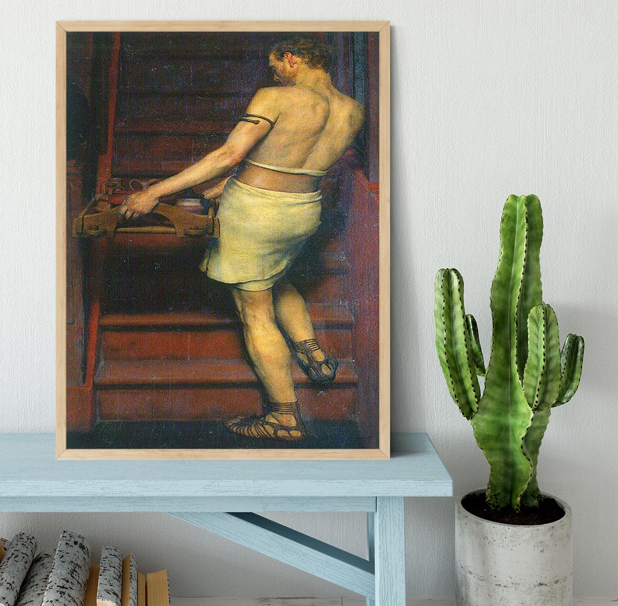 A framed print of A Roman British potters by Alma Tadema, showcasing intricate details and vibrant colors, set in a stylish handmade frame.
