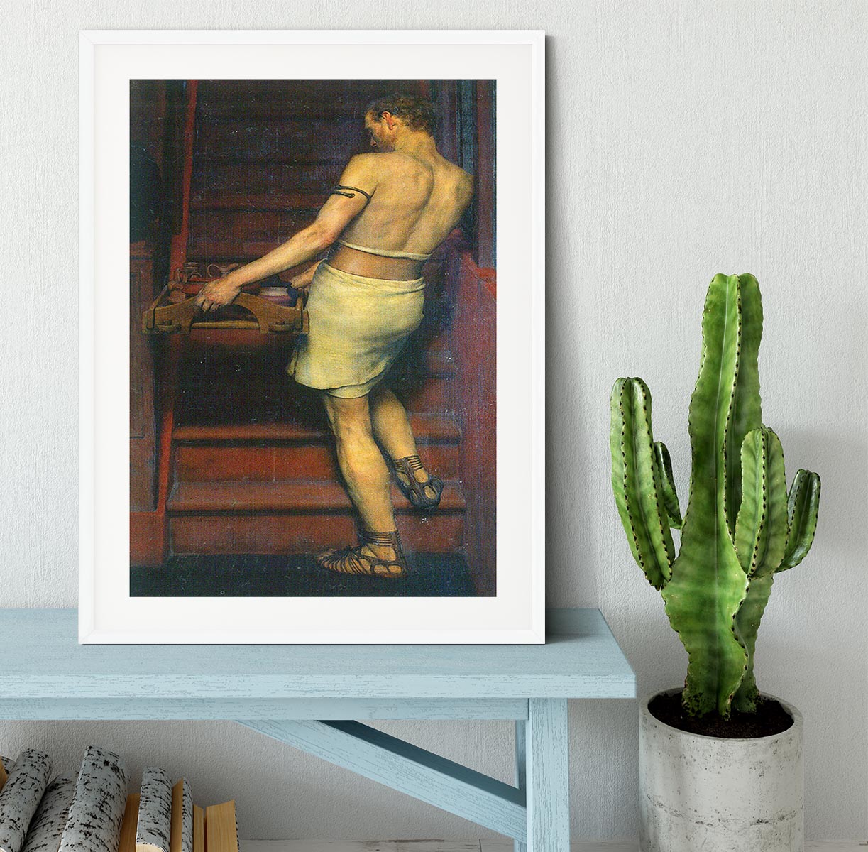 A framed print of A Roman British potters by Alma Tadema, showcasing intricate details and vibrant colors, set in a stylish handmade frame.