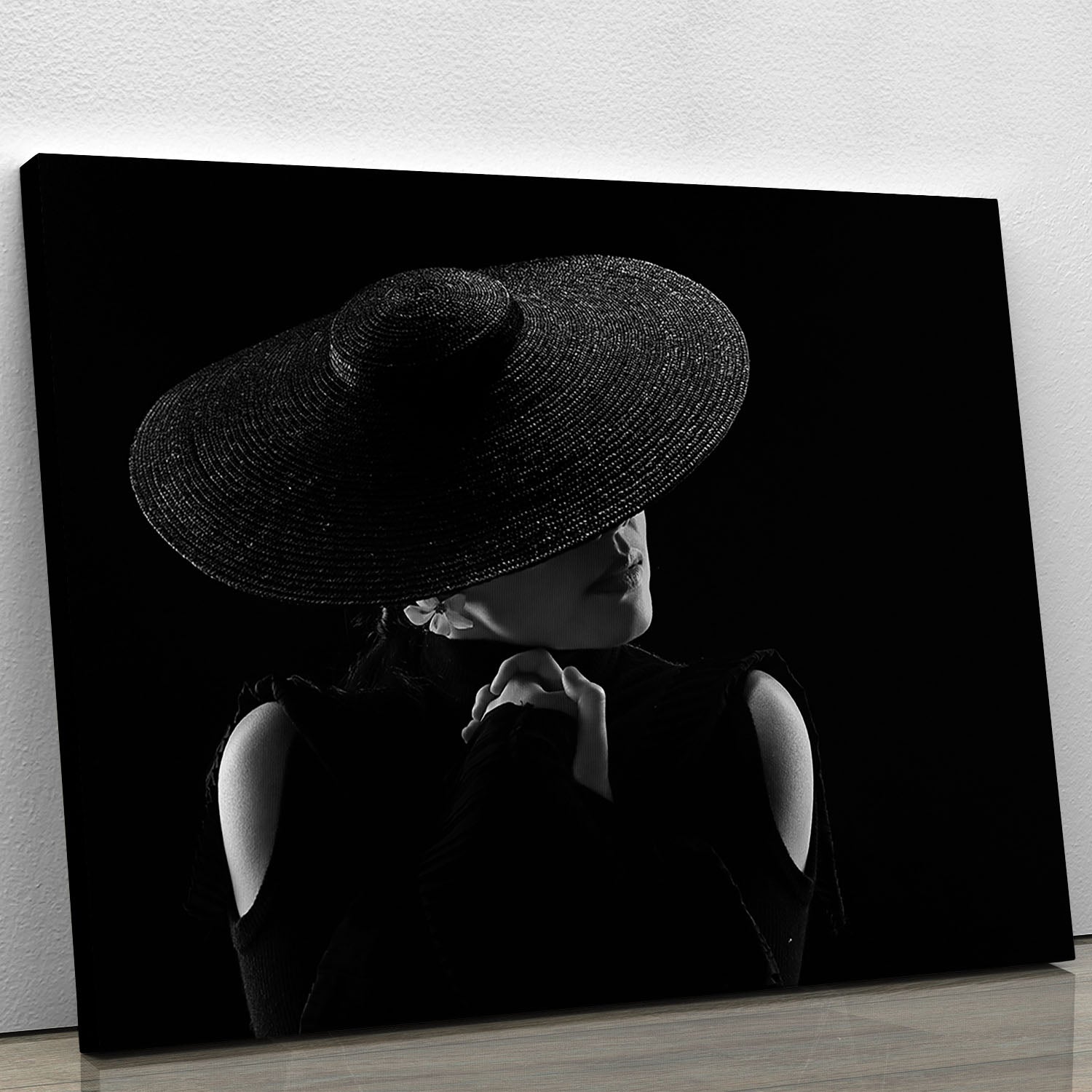 A striking canvas print titled 'A Woman In A Hate', showcasing modern art with vibrant colors and intricate details.