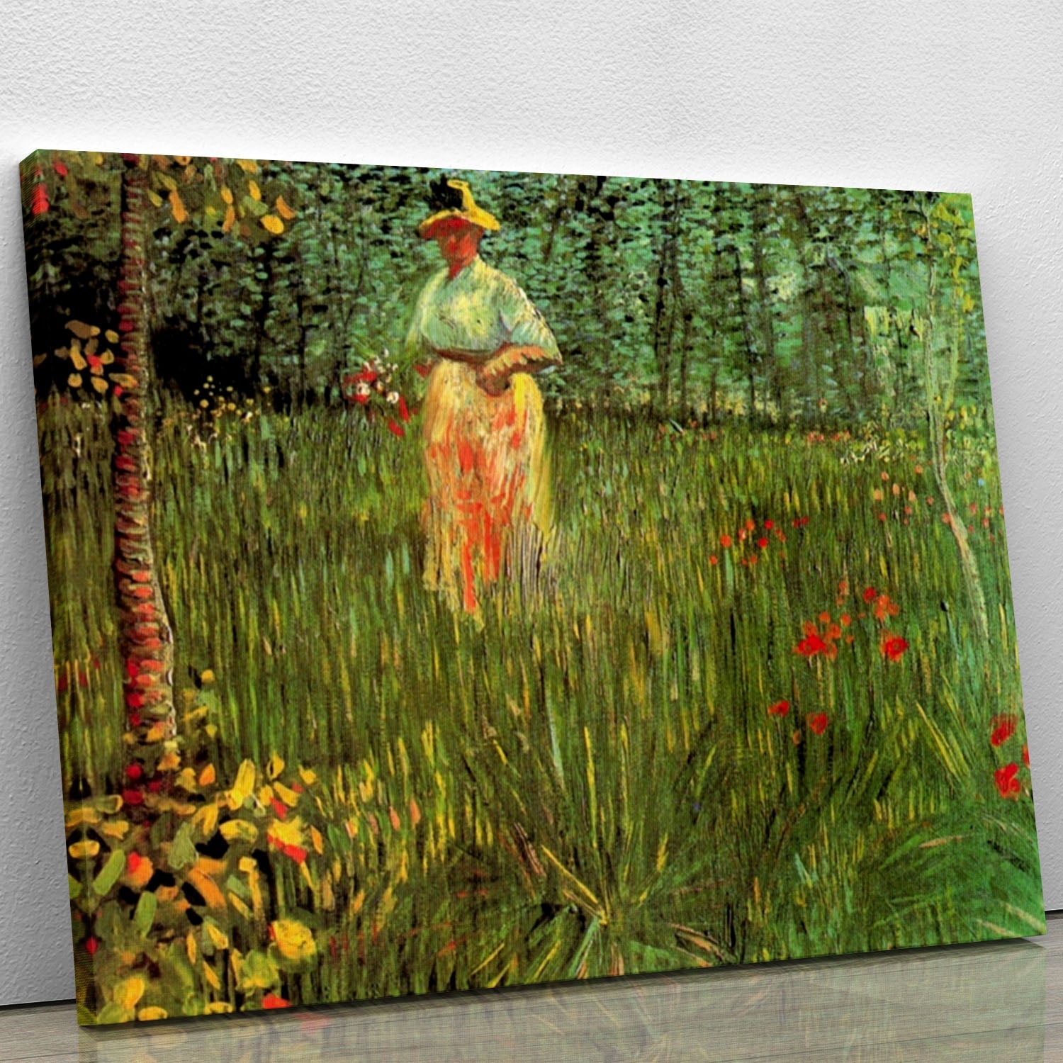 Canvas print of Van Gogh's 'A Woman Walking in a Garden', showcasing a woman in a vibrant garden setting.