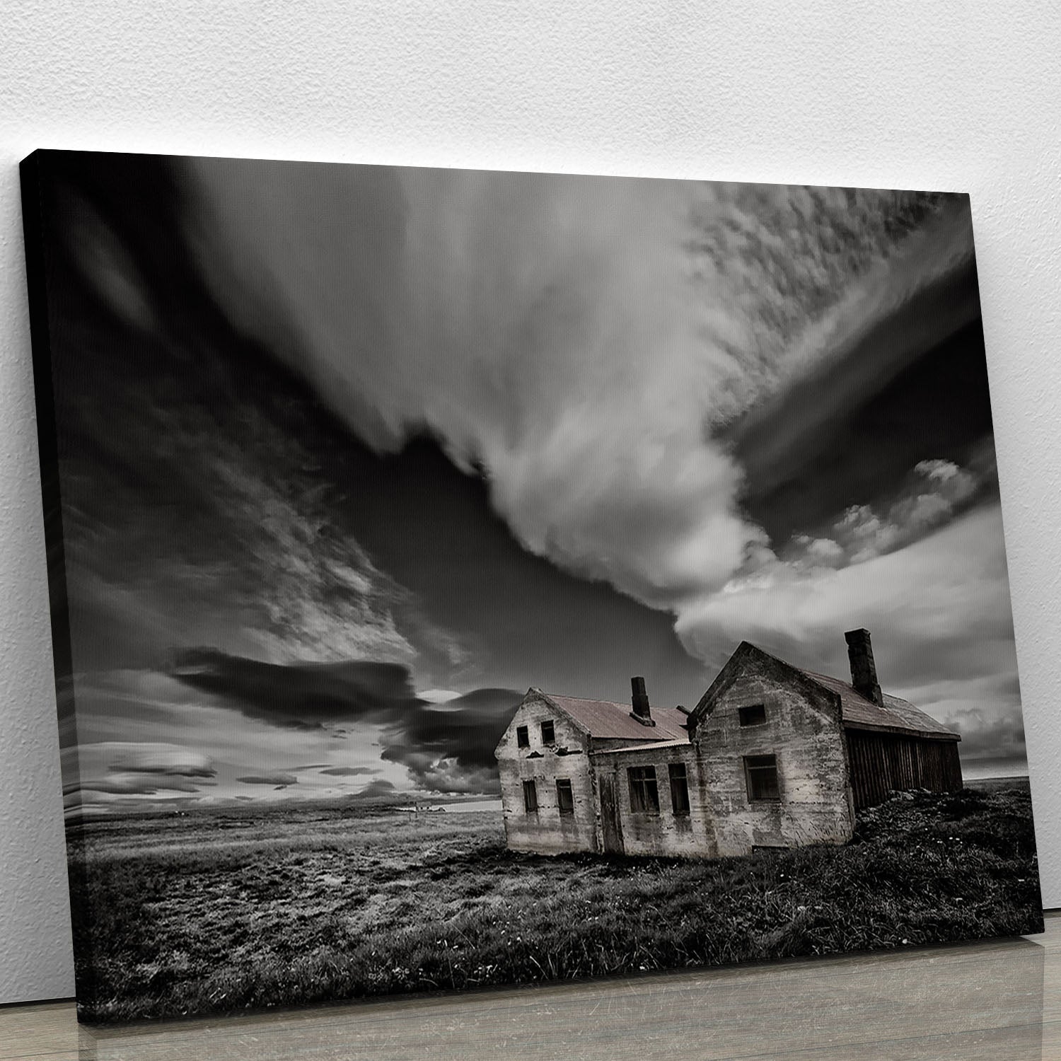 A beautiful canvas print of an abandoned beachside house, showcasing its rustic charm and serene coastal surroundings.