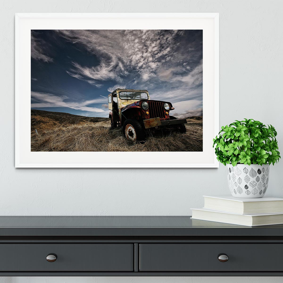 Framed print of an abandoned truck in a picturesque countryside setting, showcasing vibrant colors and quality craftsmanship.
