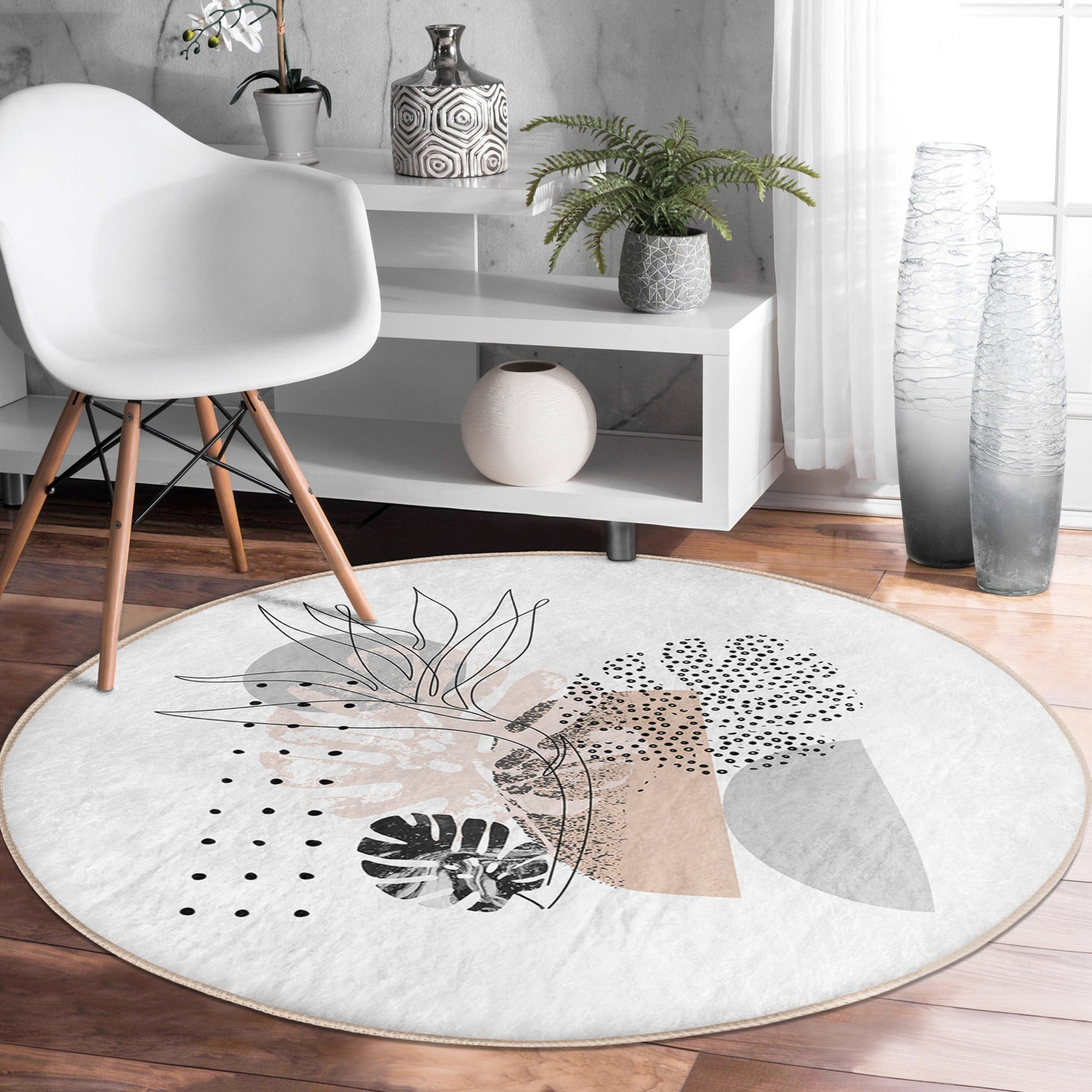 A stylish abstract round rug in soft velvet fabric, featuring a minimalist design suitable for living rooms.