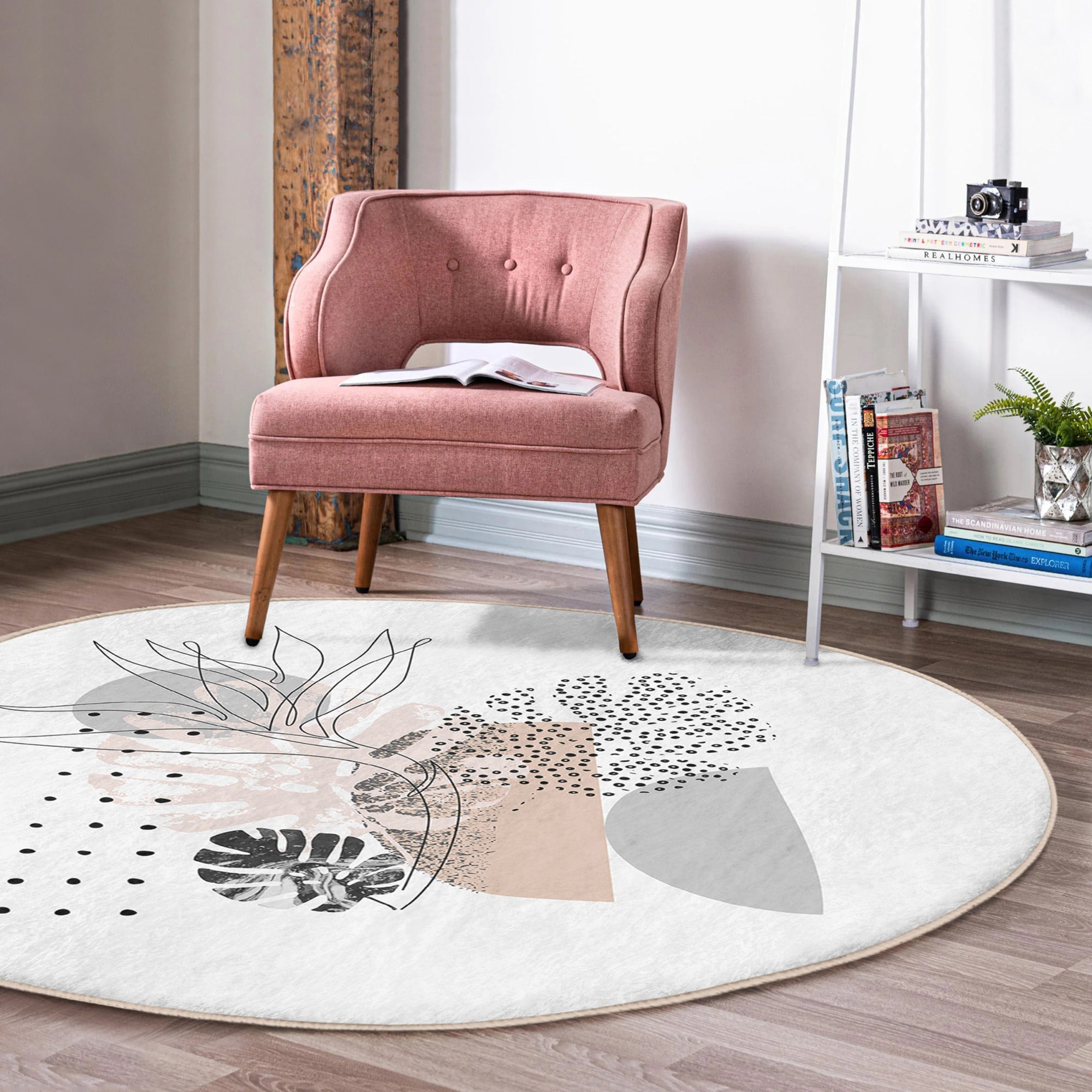 A stylish abstract round rug in soft velvet fabric, featuring a minimalist design suitable for living rooms.