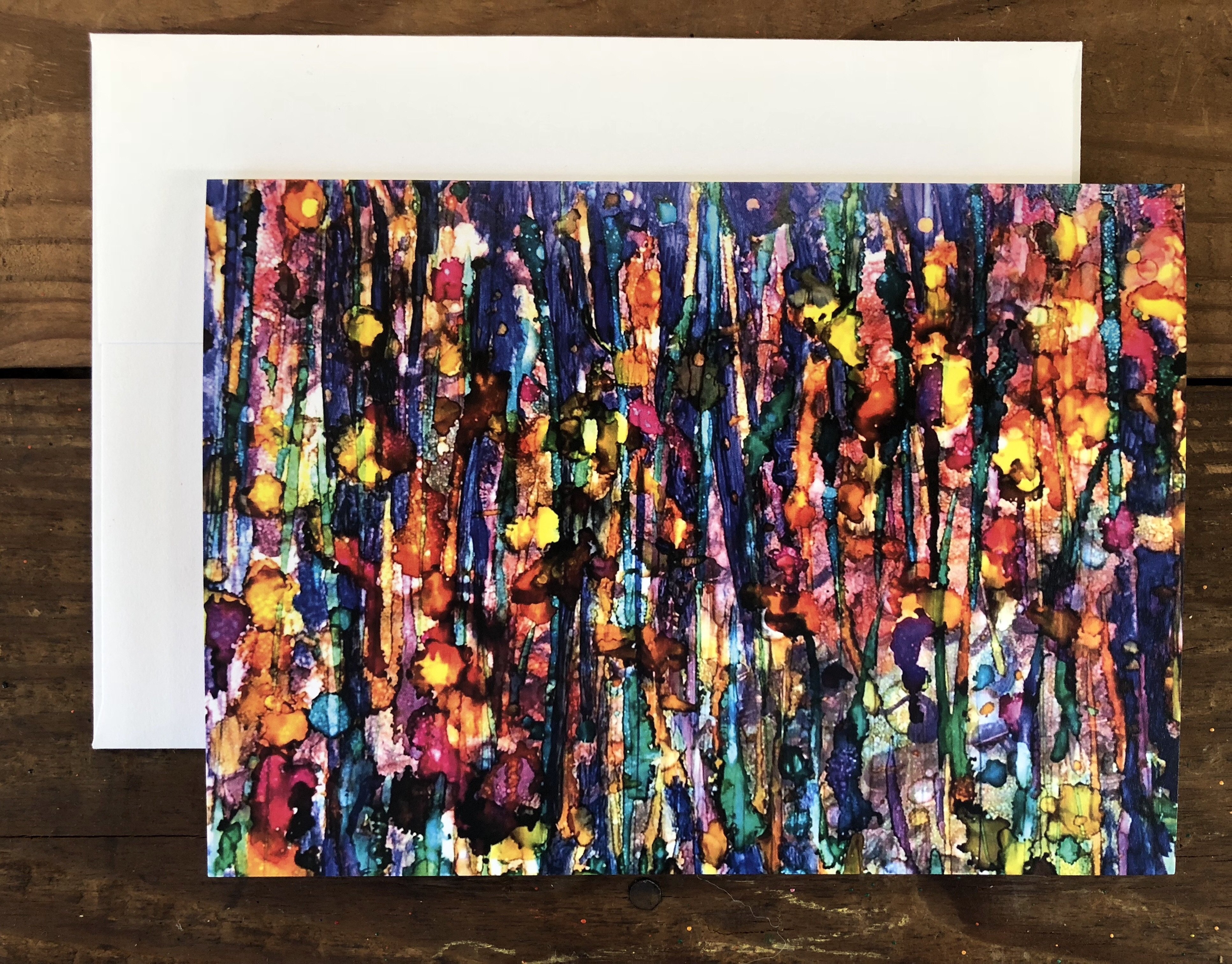 A vibrant abstract landscape painting titled Abstract Forest, featuring intricate details and soothing colors created with alcohol inks.