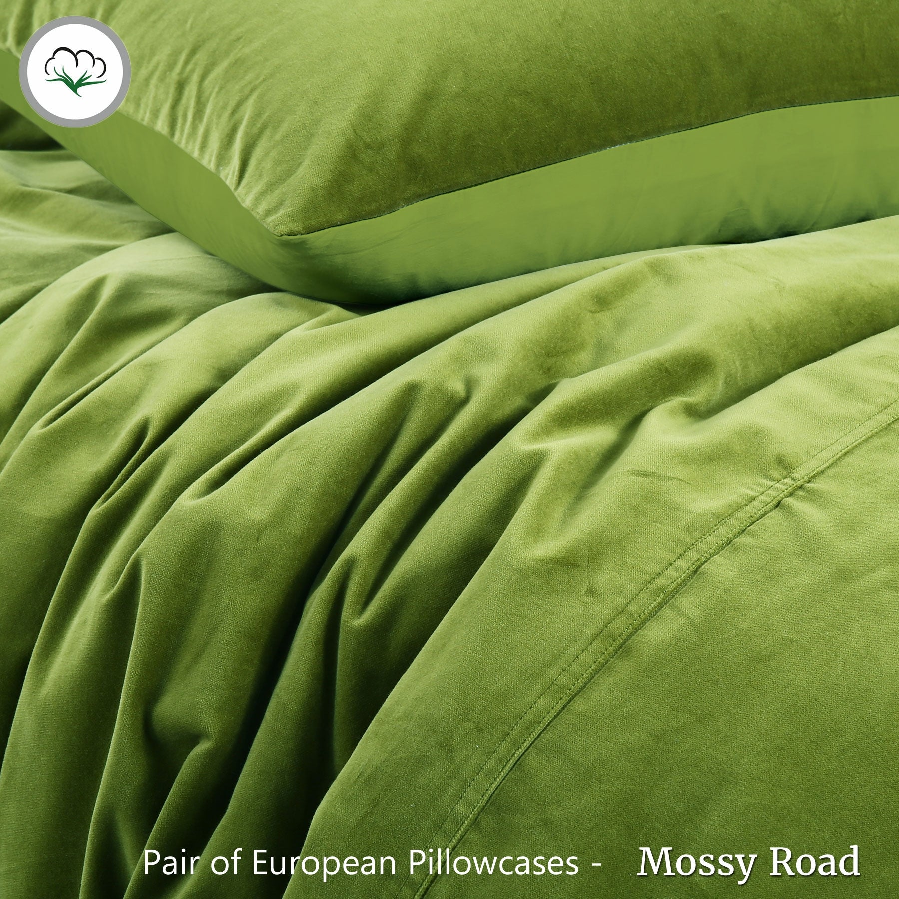 Pair of Cotton Velvet European Pillowcases in Mossy Road green, showcasing a soft texture and solid color design.