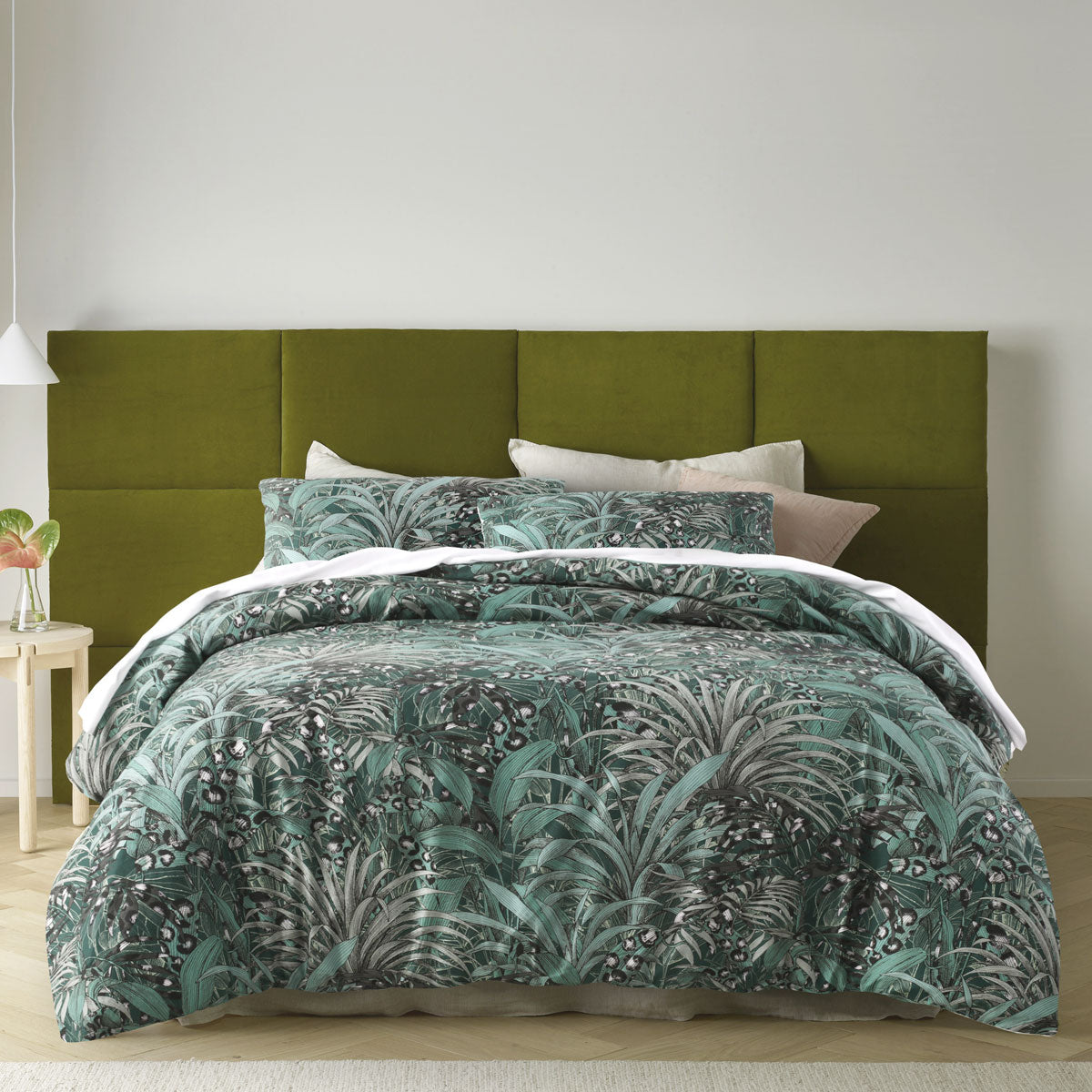 Accessorize Palm Leopard Green Cotton Quilt Cover Set featuring a vibrant botanical design with green, teal, and black hues.