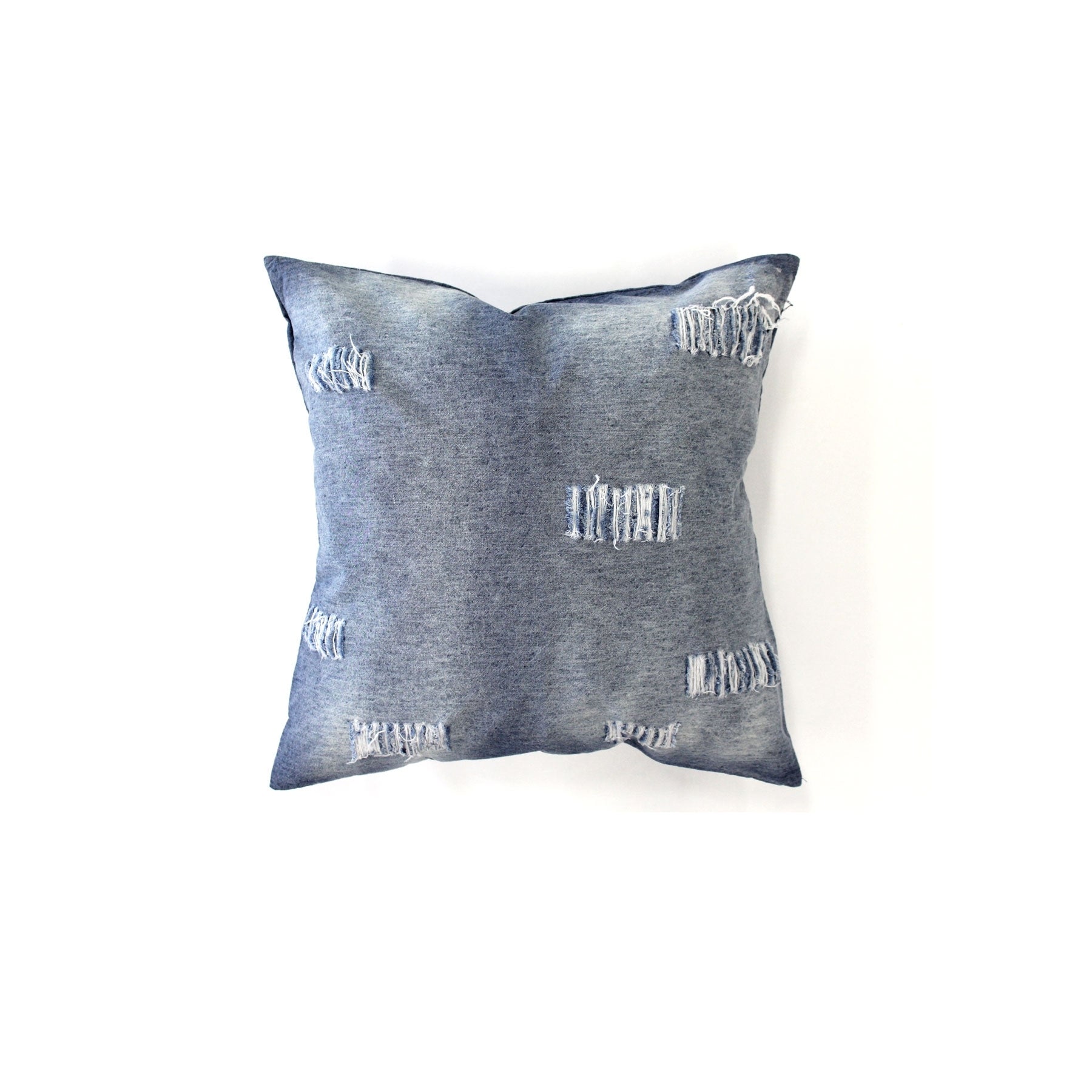 Accessorize Stonewashed Denim Ripped Linen Cotton Cushion Cover featuring a stylish ripped texture in blue and white tones.