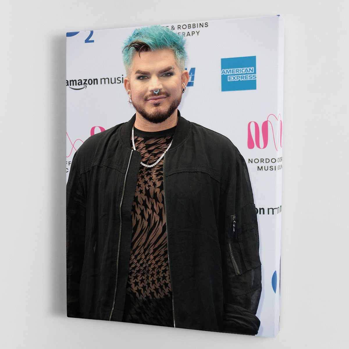 A vibrant Adam Lambert canvas print showcasing his iconic style and charisma, perfect for home or office decor.
