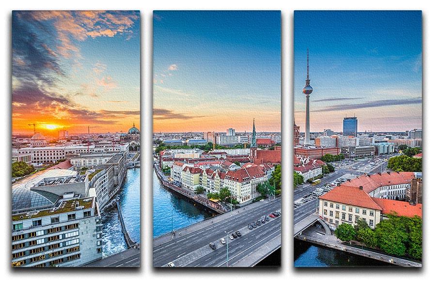 Aerial view of Berlin skyline depicted in a stunning 3-panel canvas print, showcasing iconic buildings and vibrant city life.