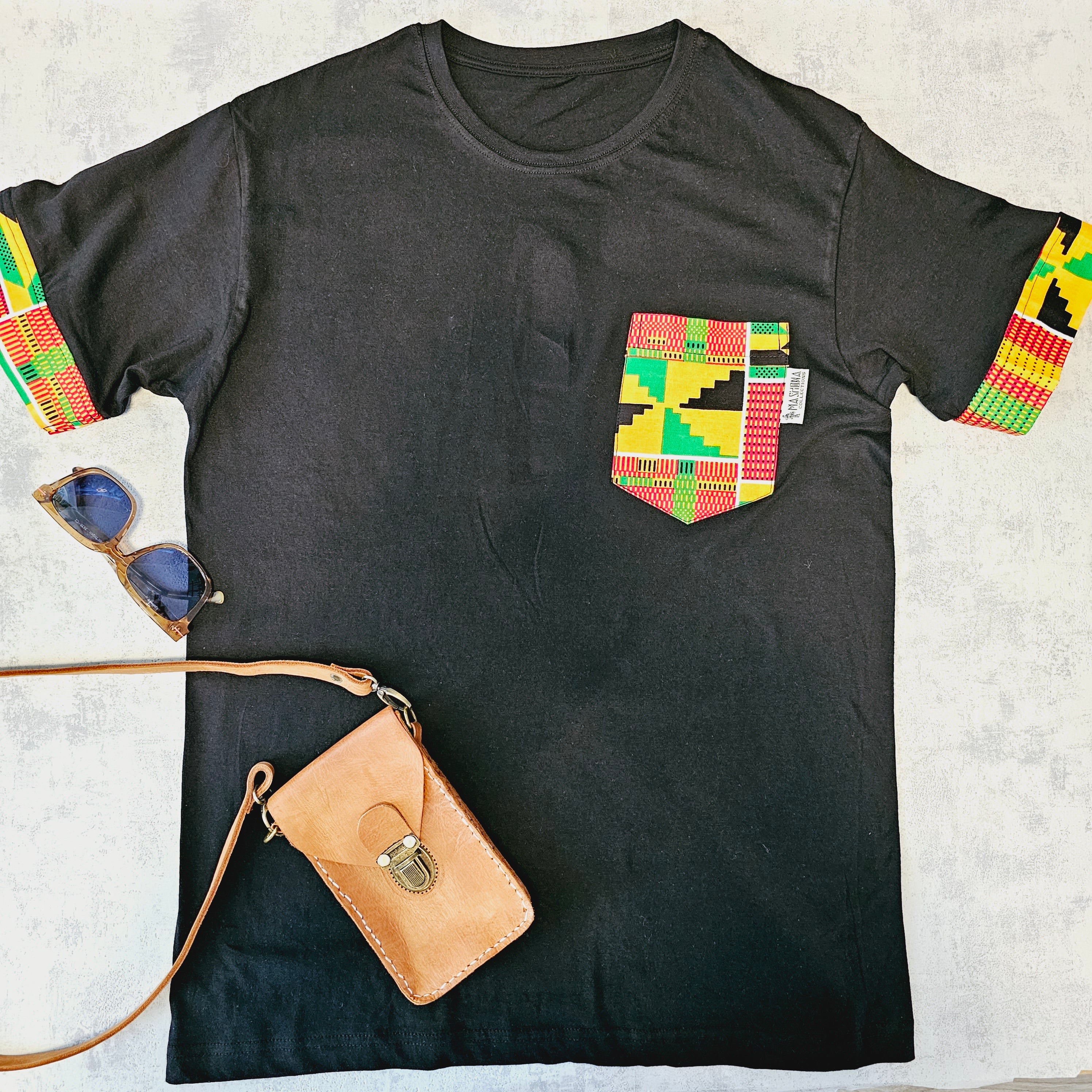 Africa Print Detailed T-Shirt featuring a black base with vibrant African print details and a pocket, showcasing a casual yet stylish design.