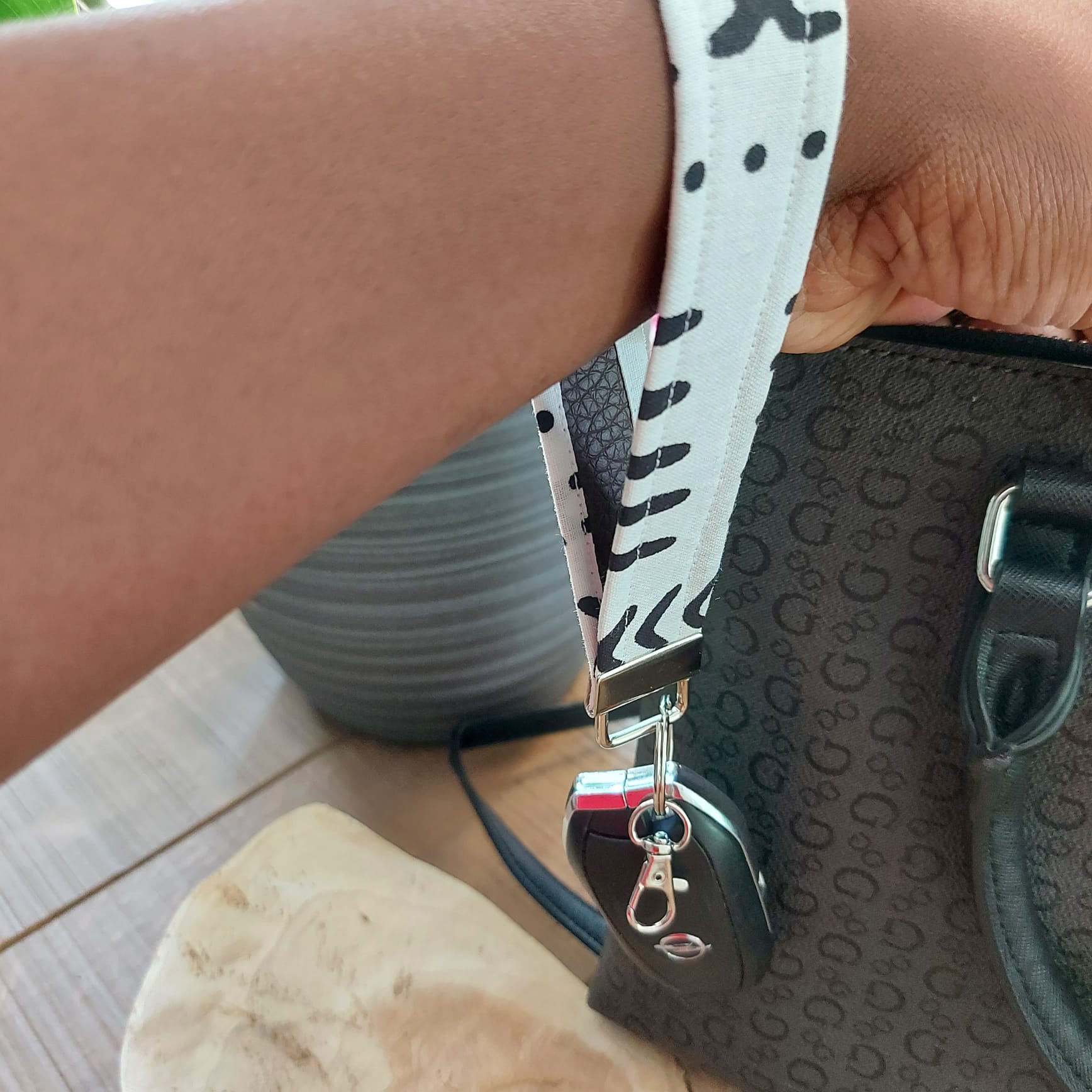 African Print and Leather Key Fob wristlet key holder featuring vibrant patterns and vegan leather lining.