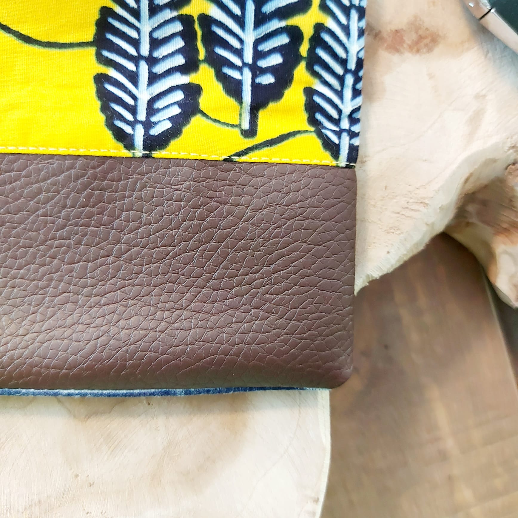 African Print Zipper Pouch made of vegan leather, featuring unique wax prints, perfect for make-up and stationery storage.