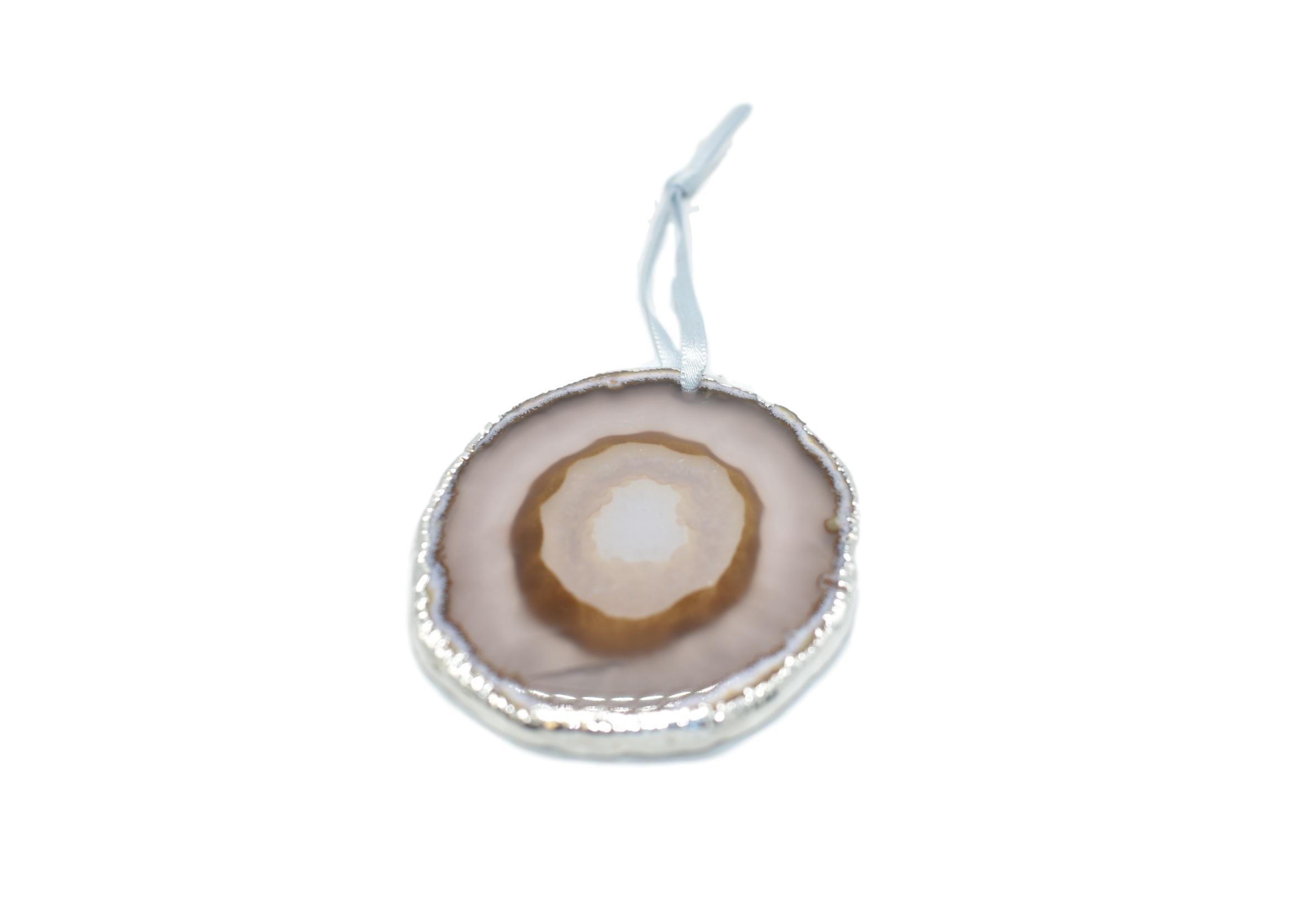 A beautiful agate ornament with silver electroplating, hanging from a silver silk ribbon, showcasing unique patterns and colors.