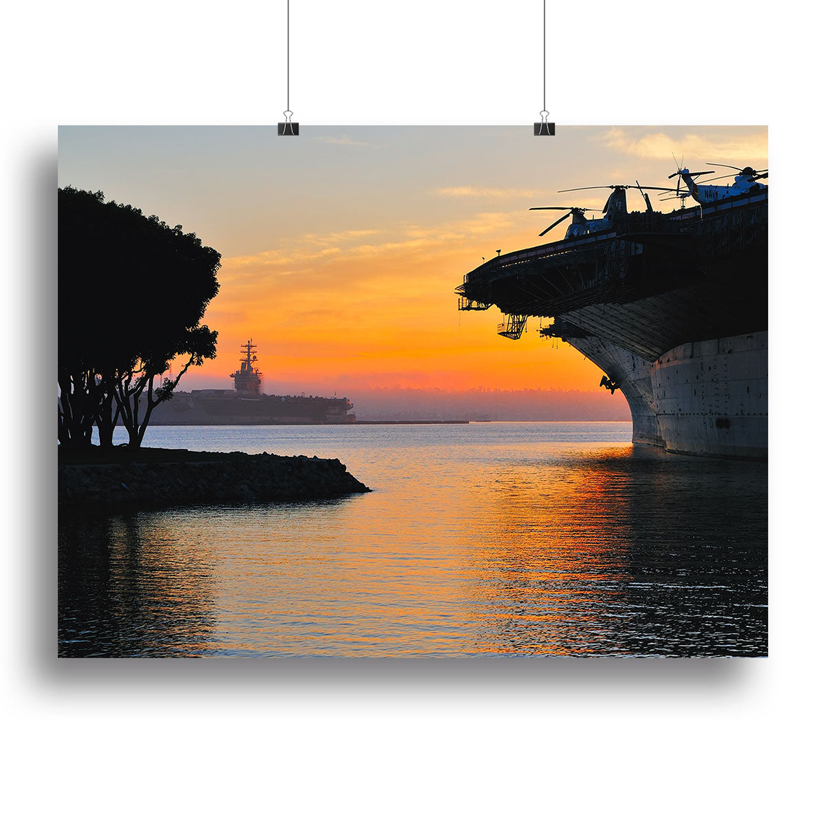 A stunning canvas print of an aircraft carrier in a harbor during sunset, showcasing vibrant colors and intricate details.