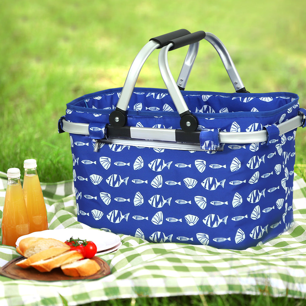 Alfresco Picnic Bag Basket in a natural outdoor setting, showcasing its durable polyester fabric and lightweight aluminium frame.