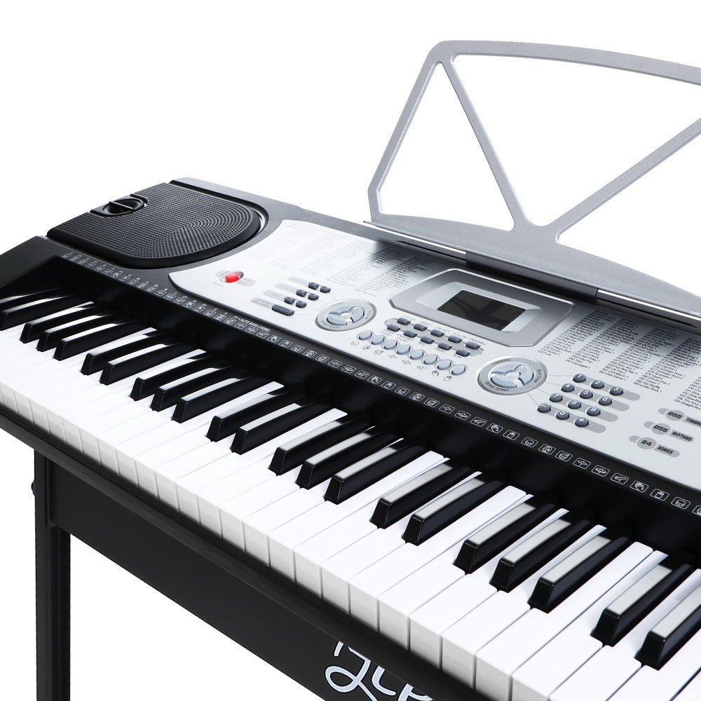 Alpha 61 Keys Electronic Piano Keyboard in silver with LED display, showcasing its features and design.