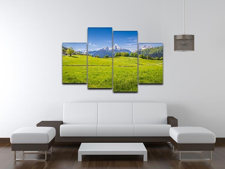 A beautiful 4-panel canvas artwork depicting the Alps with a fresh green meadow, showcasing vibrant colors and a serene landscape.