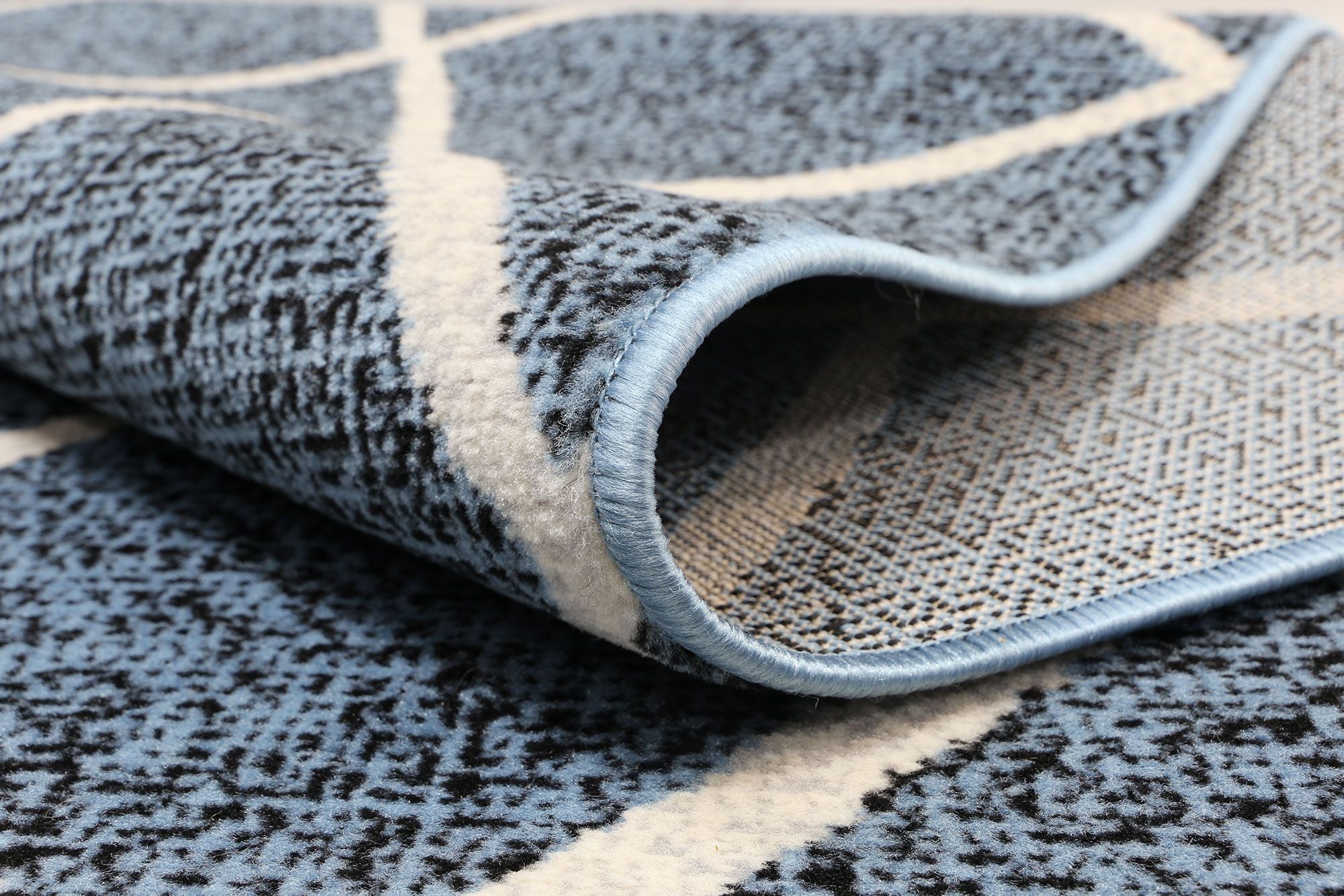 Allure Cross Diamond Blue Cream Rug, 240x330 cm, featuring a stylish diamond pattern in blue and cream colors, perfect for indoor decor.