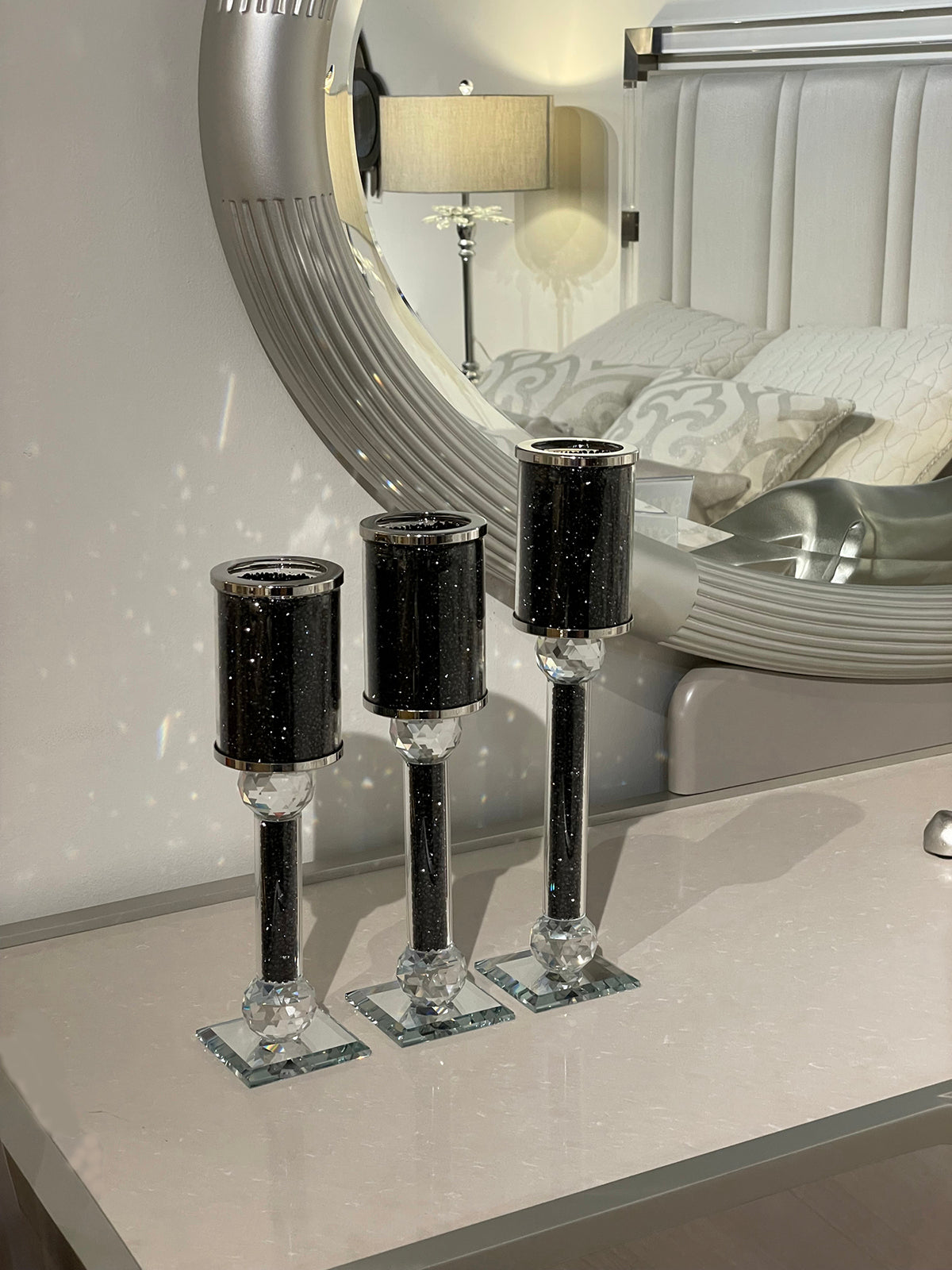 Ambrose 3 Candles Holder Set featuring black crushed diamonds glass, showcasing three elegant candlestick holders in varying heights.