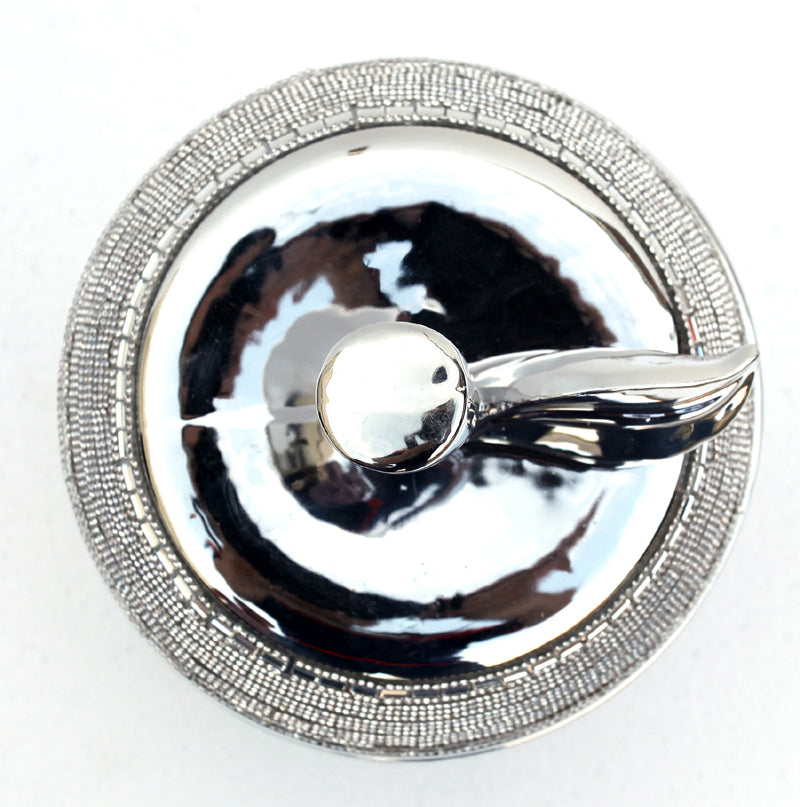 Ambrose Chrome Plated Crystal Embellished Lidded Ceramic Apple Bowl with a shiny chrome finish and sparkling crystal details, elegantly displayed.