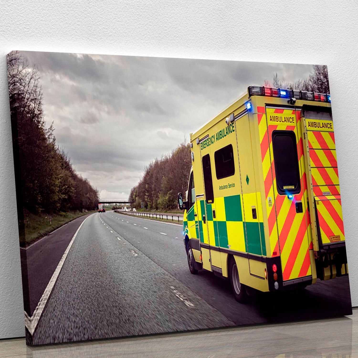 Canvas print of an ambulance responding to an emergency, showcasing vibrant colors and dynamic imagery.