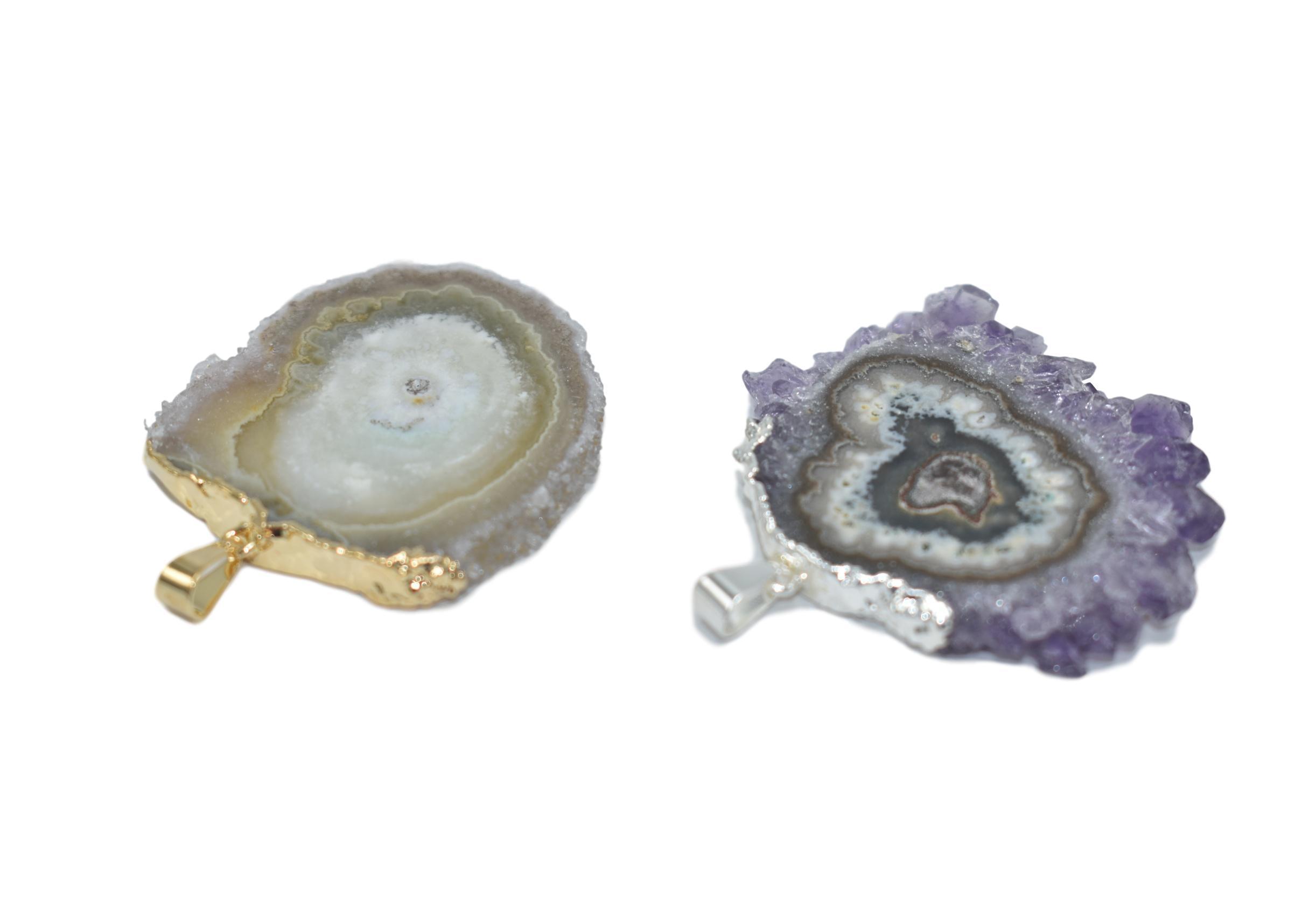 Amethyst Stalactite Pendant with silver or gold trim, showcasing unique color patterns.