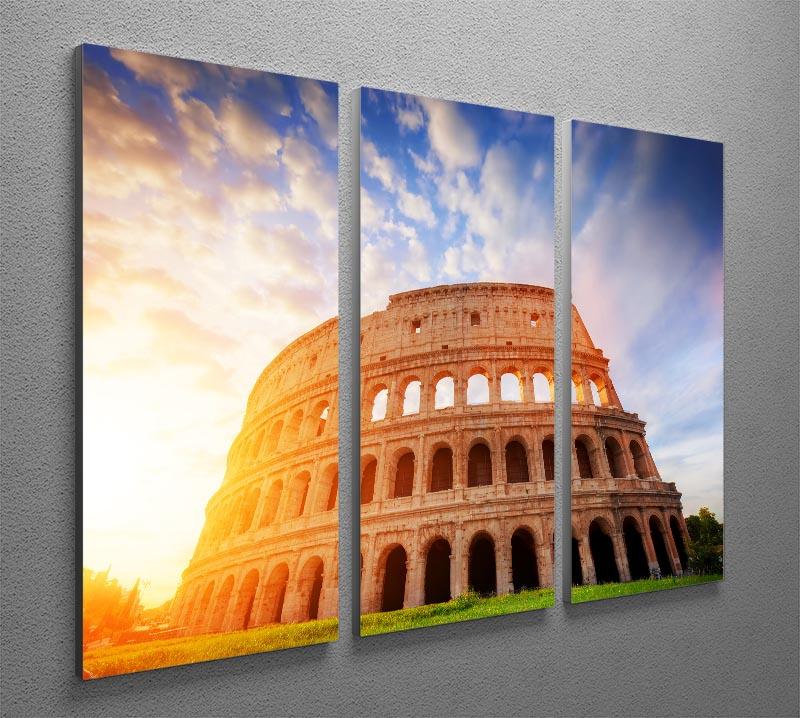 A beautiful 3-panel canvas print depicting an amphitheatre illuminated by sunrise light, showcasing vibrant colors and intricate details.