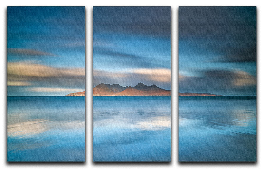 Three-panel canvas print depicting a stunning sunrise over Eigg, showcasing vibrant colors and serene landscape.