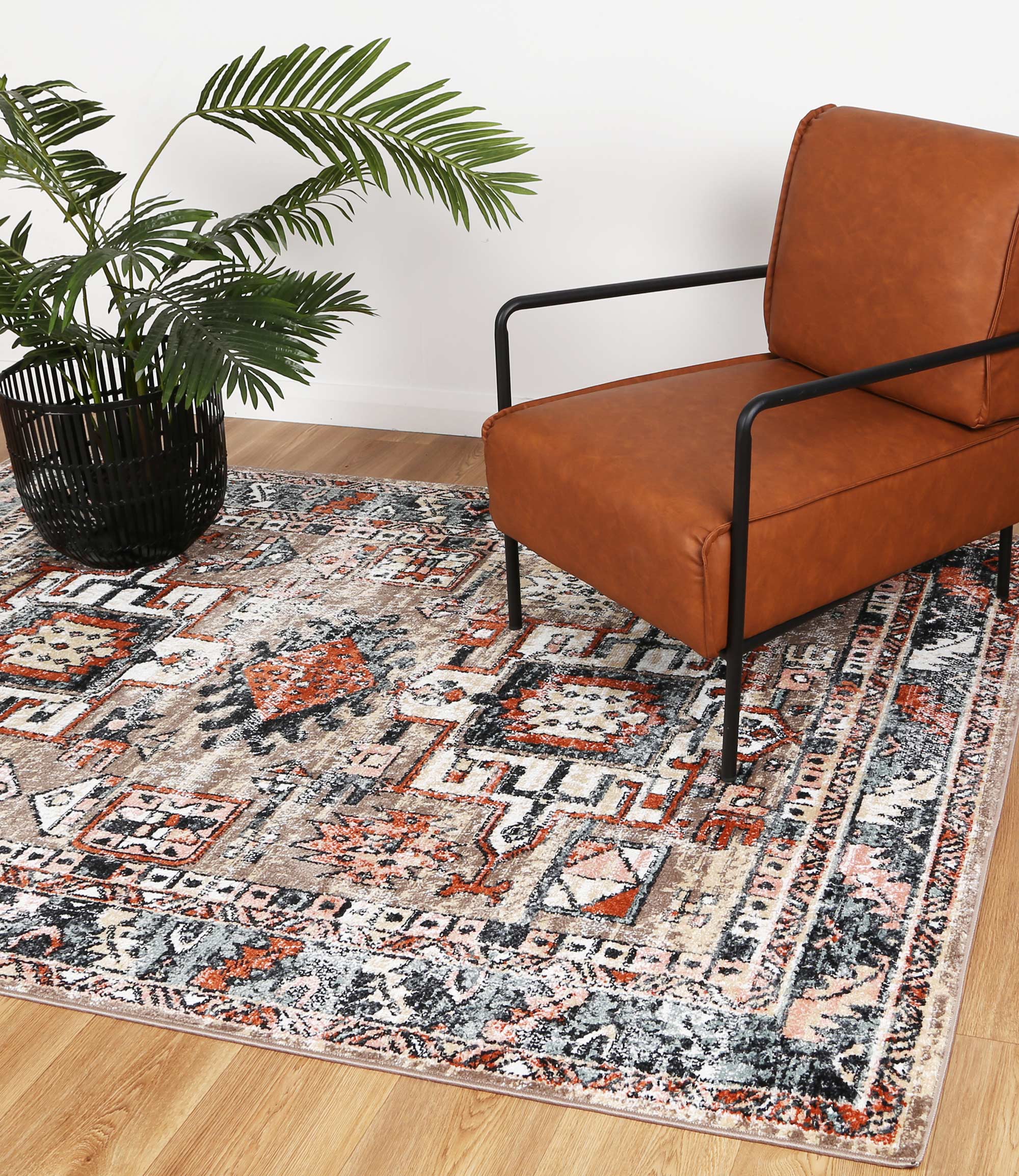Anatolia Traditional Multi Rug 240x330cm showcasing an antique design with a color palette of black, grey, cream, and terracotta, perfect for home decor.