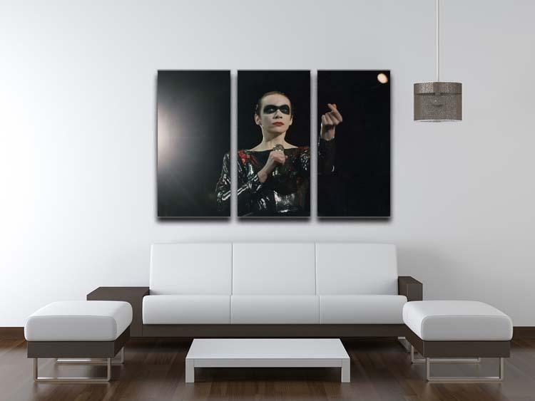Annie Lennox in concert 3-panel canvas print showcasing vibrant colors and detailed imagery, perfect for home decor.