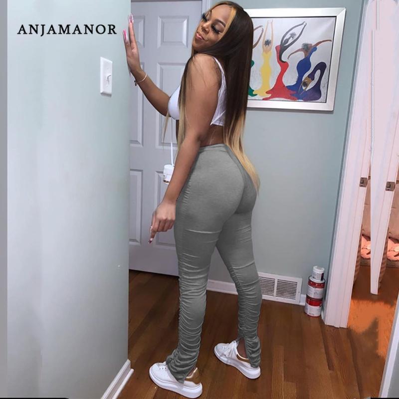 ANJAMANOR Split Ruched Stacked Sweatpants in plus sizes, showcasing stylish design and comfortable fit.