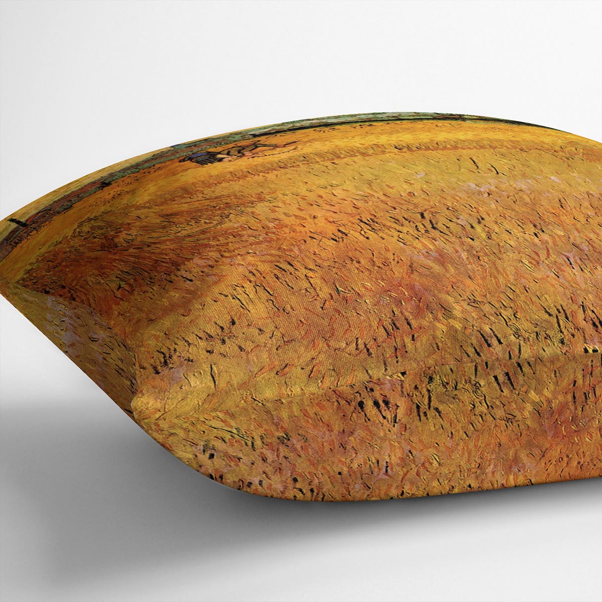 A vibrant cushion featuring Van Gogh's Arles View from the Wheat Fields, made from luxurious vegan faux suede.