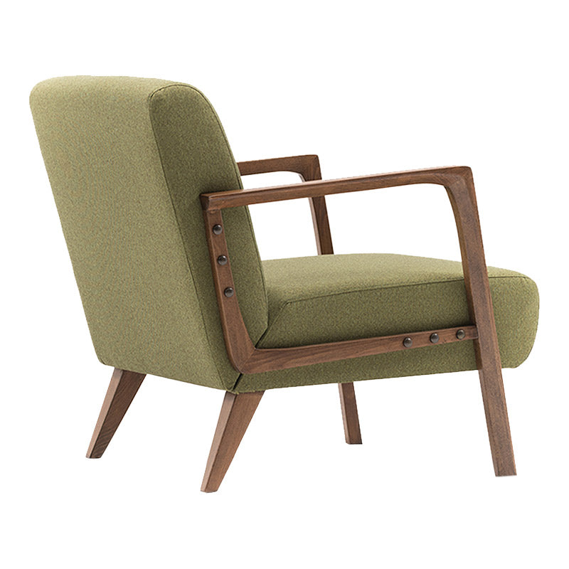 BUCKINGHAM Green Armchair with natural beech wood legs, featuring a stylish green-brown fabric upholstery.