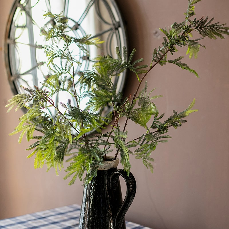 A tall 47-inch artificial Acacia plant stem with realistic green leaves, perfect for home or office decor.