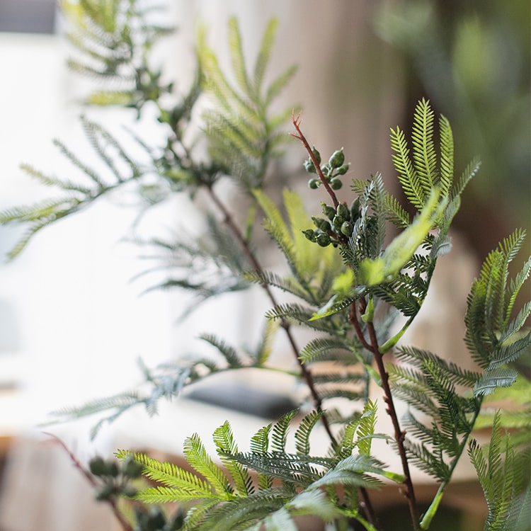 A tall 47-inch artificial Acacia plant stem with realistic green leaves, perfect for home or office decor.