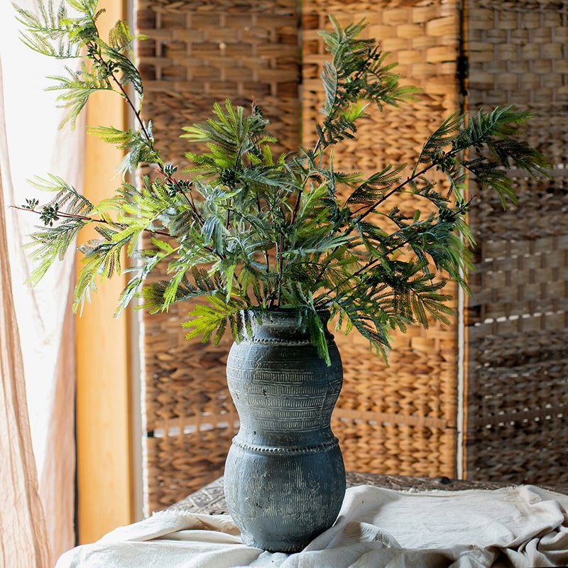 A tall 47-inch artificial Acacia plant stem with realistic green leaves, perfect for home or office decor.
