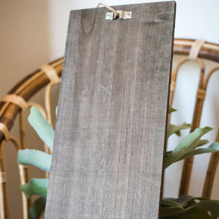 Artificial Faux Fern Madagascar Staghorn mounted on a wooden board, showcasing vibrant green fronds and a rustic brown background.