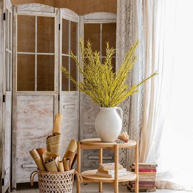 A tall 46-inch yellow artificial flax grass stem, showcasing vibrant color and realistic design, perfect for home decor.