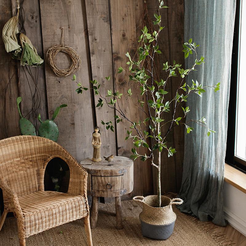 Artificial Green Leaf Faux Tree in a stylish black pot, showcasing realistic green leaves and a lifelike appearance.